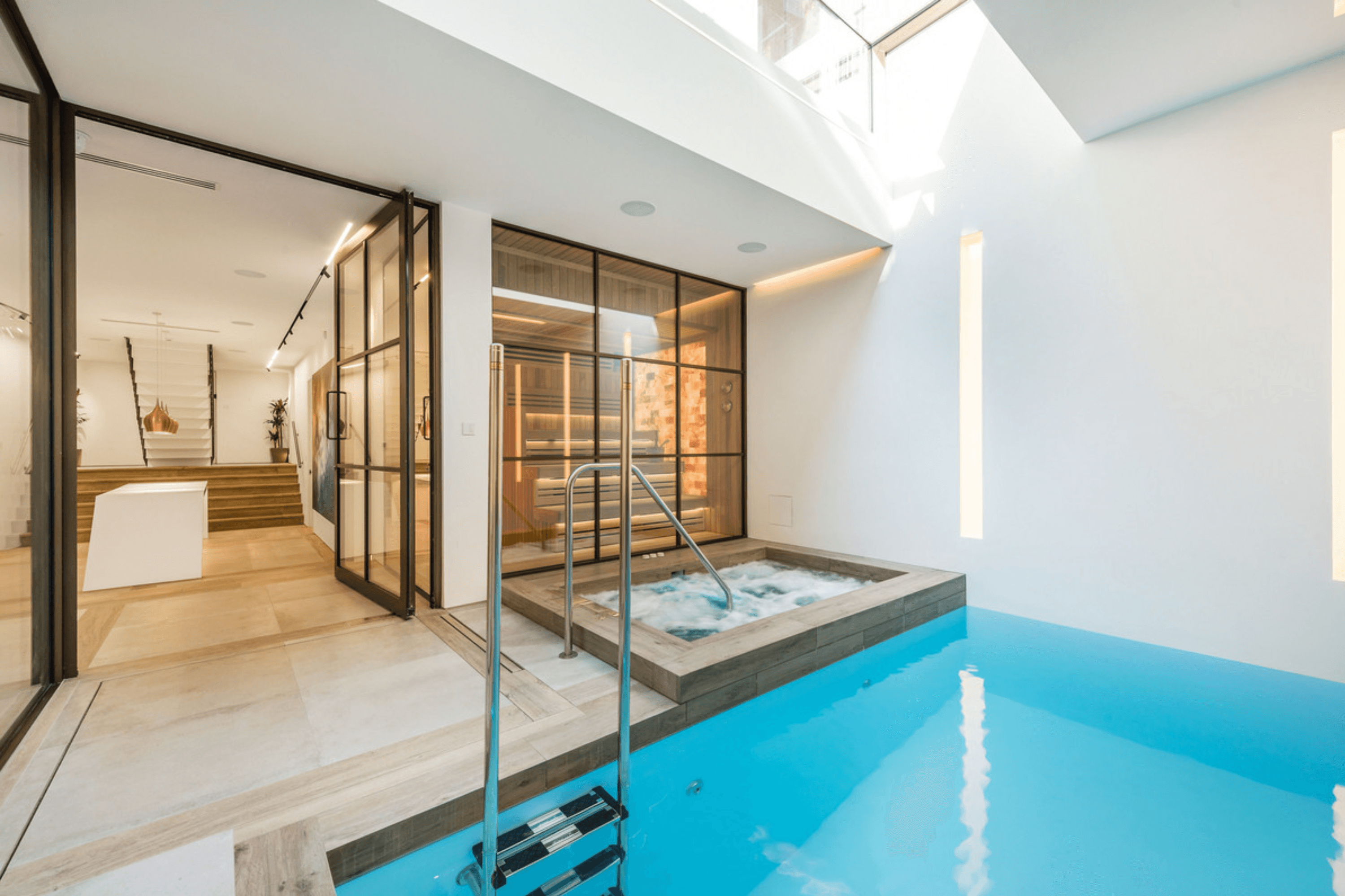 Private spa area featuring jacuzzi, glass enclosed Himalayan salt sauna and access to indoor pool.