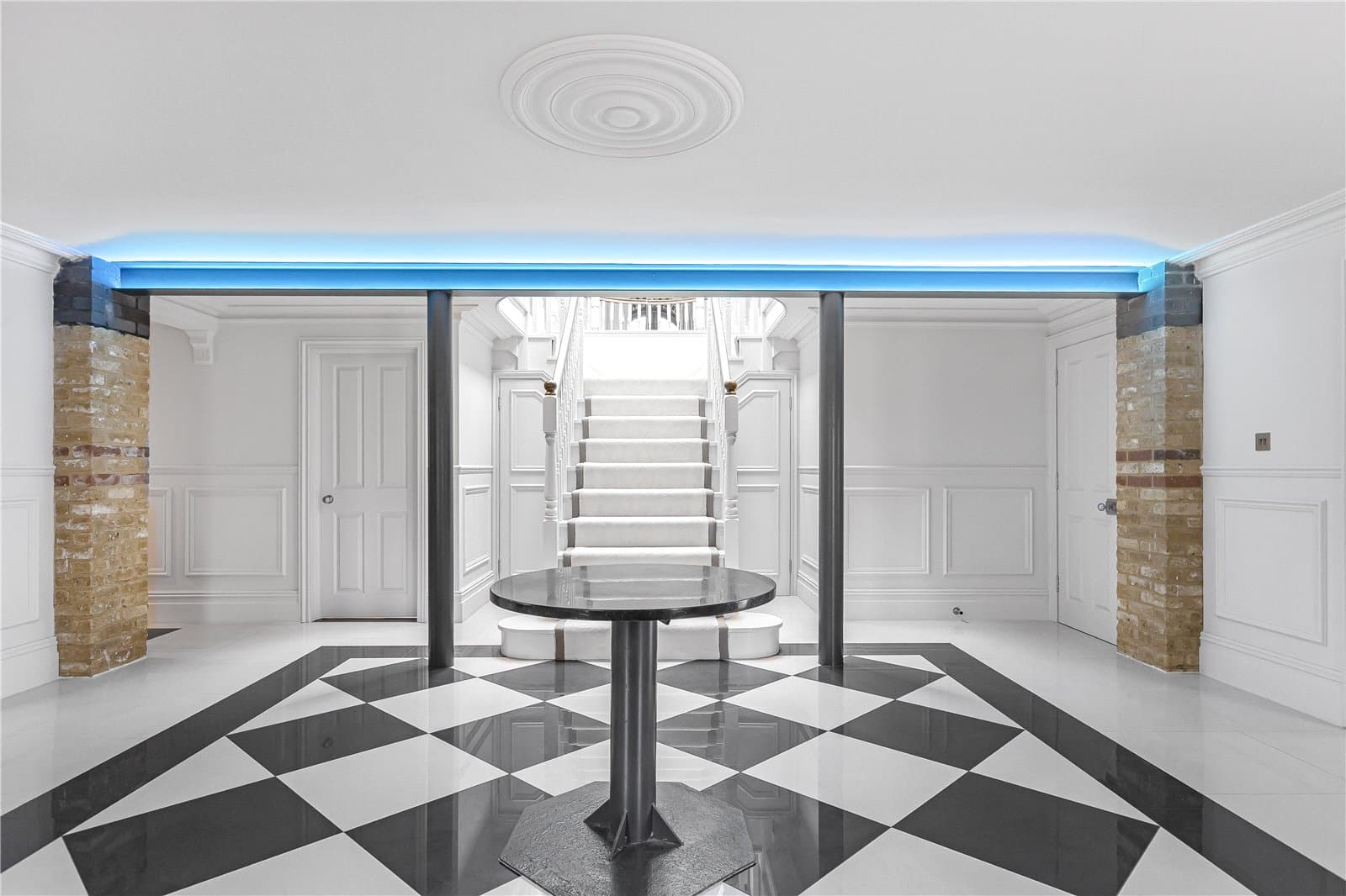 Grand reception hallway with statement staircase, black and white tiled flooring and architectural detailing  5. Kitchen and dining area  Alt text: Open plan kitchen and dining space with marble island, exposed brick walls and large sliding doors opening to terrace  6. Family living space  Alt text: Open plan living area with television wall, exposed brick detailing and full height glazing overlooking the garden  7. Bespoke bar room  Alt text: Entertaining room with bespoke cocktail bar, marble counter and garden views through full height glazing  8. Principal bedroom balcony  Alt text: Principal bedroom opening onto a private balcony with glass balustrade and countryside views  9. Garden room lounge  Alt text: Garden room lounge with skylight, large windows and views across landscaped grounds  10. Aerial garden perspective  Alt text: Elevated view of detached residence with landscaped gardens, gravel driveway and countryside backdrop in Theobalds Park  11. Rear garden and terrace  Alt text: Landscaped rear garden with raised deck seating area overlooking open countryside  12. Principal bedroom interior  Alt text: Principal bedroom suite with arched window, exposed brick feature and balcony overlooking the gardens  If you'd like, I can also improve the alt text to match Prime Property SEO strategy (they often include Town + County keywords like “Theobalds Park, Hertfordshire” to help the listings rank in Google Images).  for this too Title  Floor plan and internal layout  Alt text  Floor plan showing approximately 4,354 sq ft of accommodation including ground and first floor living spaces, bedroom suites, annexe and outbuilding at Theobalds Park, Hertfordshire